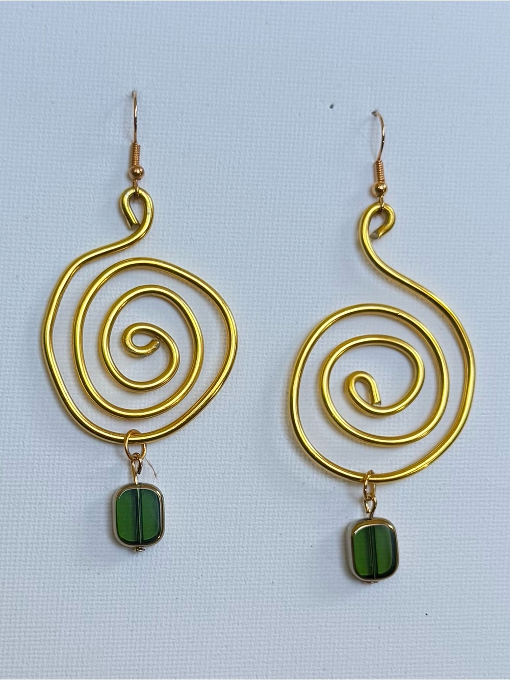 Handmade Gold Spiral Wire Drop Earrings with dangling Green Glass beads